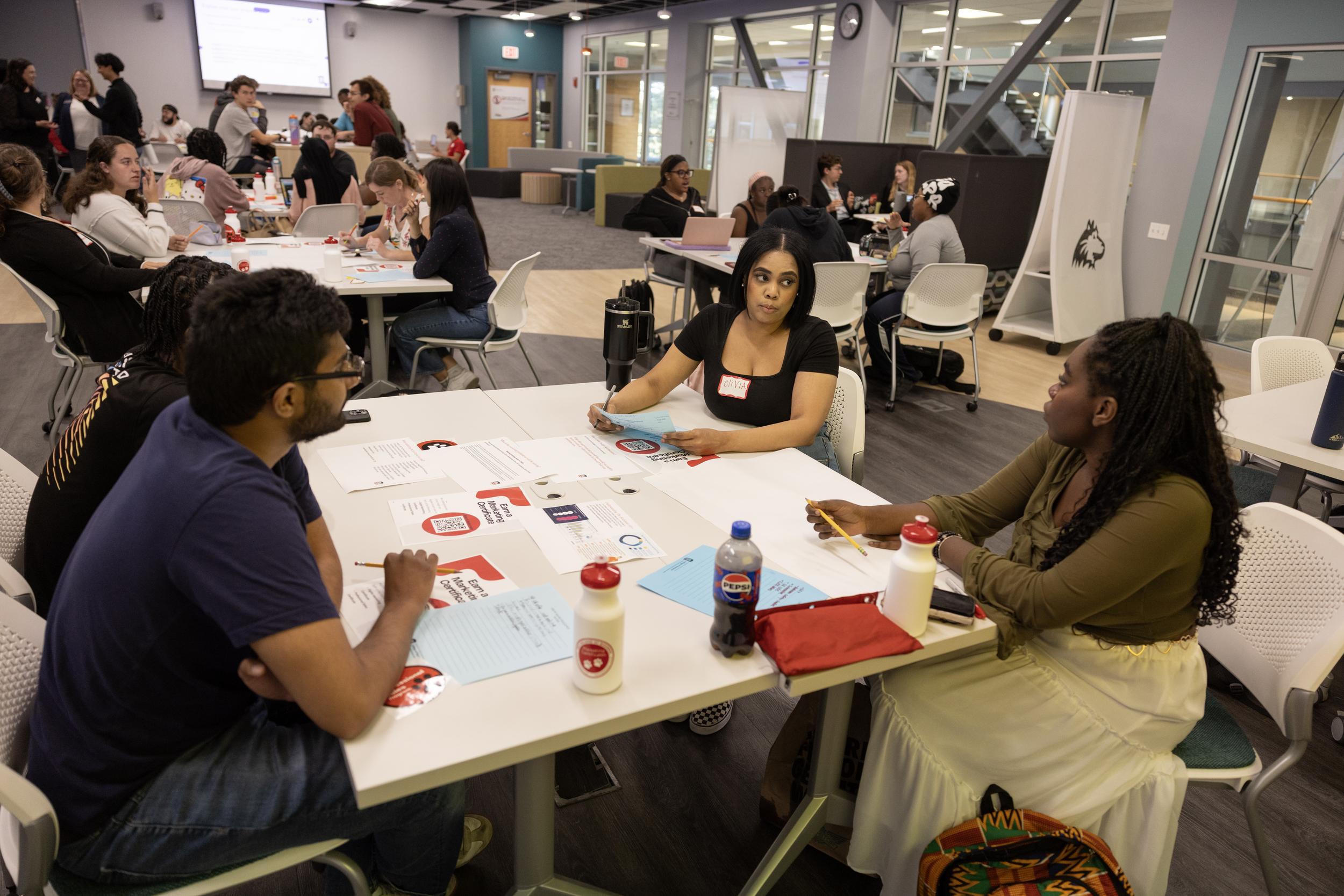 NIU College of Business students working in groups